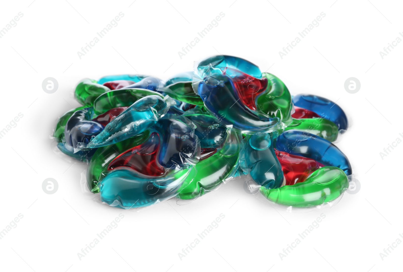 Photo of Heap of laundry capsules on white background