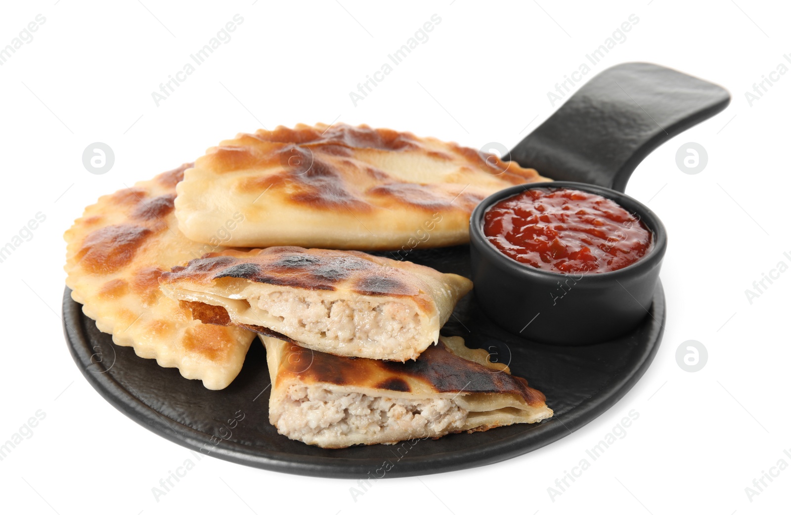 Photo of Delicious fried chebureki with ketchup isolated on white