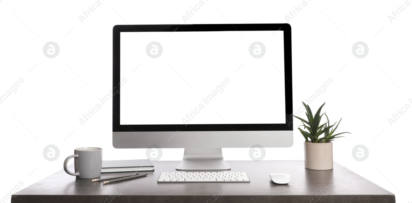 Photo of Table with modern computer, decor and stationery on white background