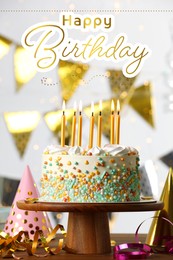 Image of Happy Birthday! Beautiful cake with burning candles and decor on wooden table