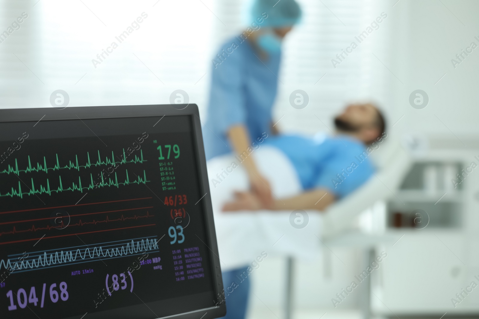 Photo of Monitor with cardiogram in hospital, focus on screen. Space for text