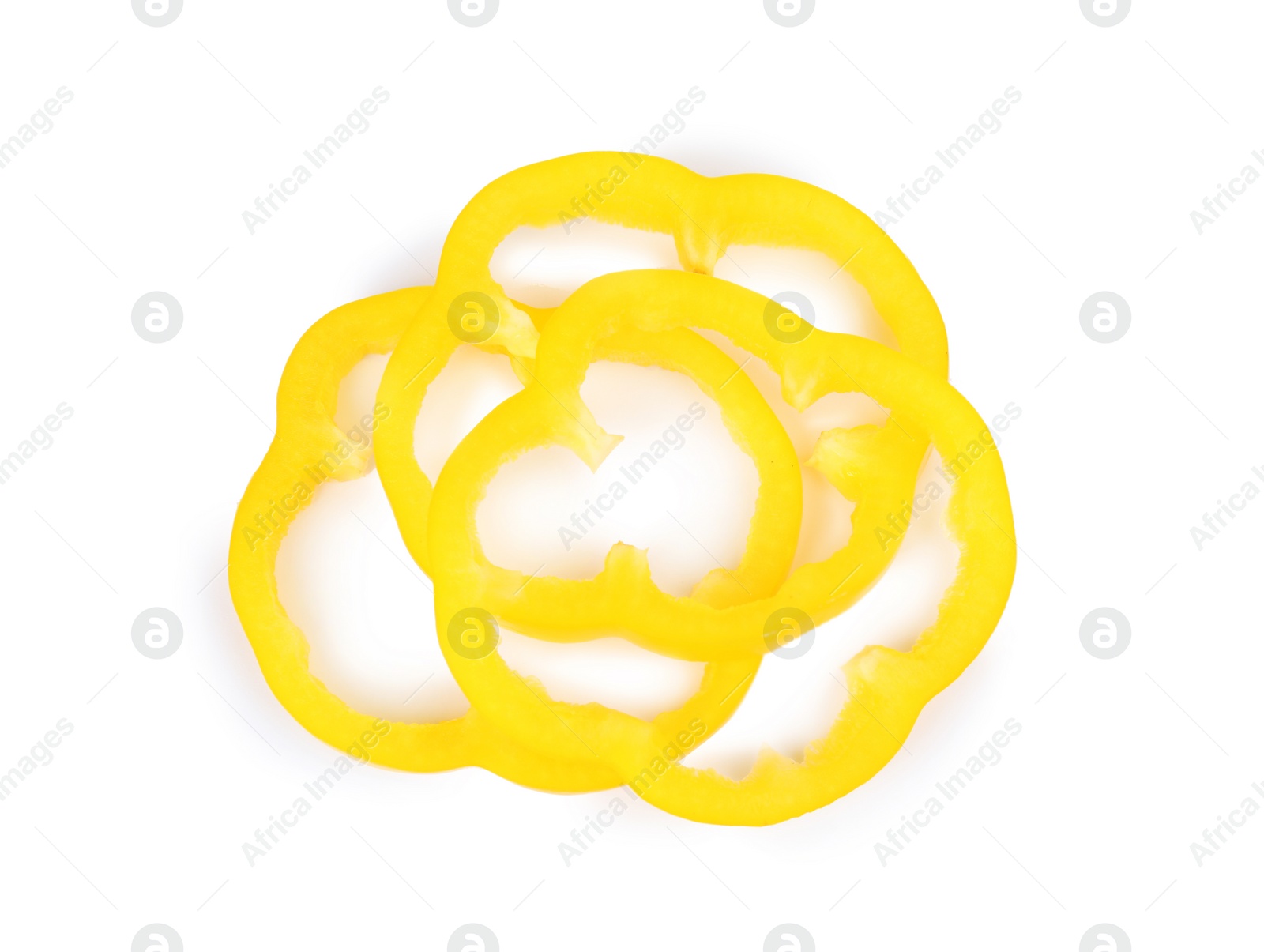 Photo of Rings of yellow bell pepper isolated on white, top view