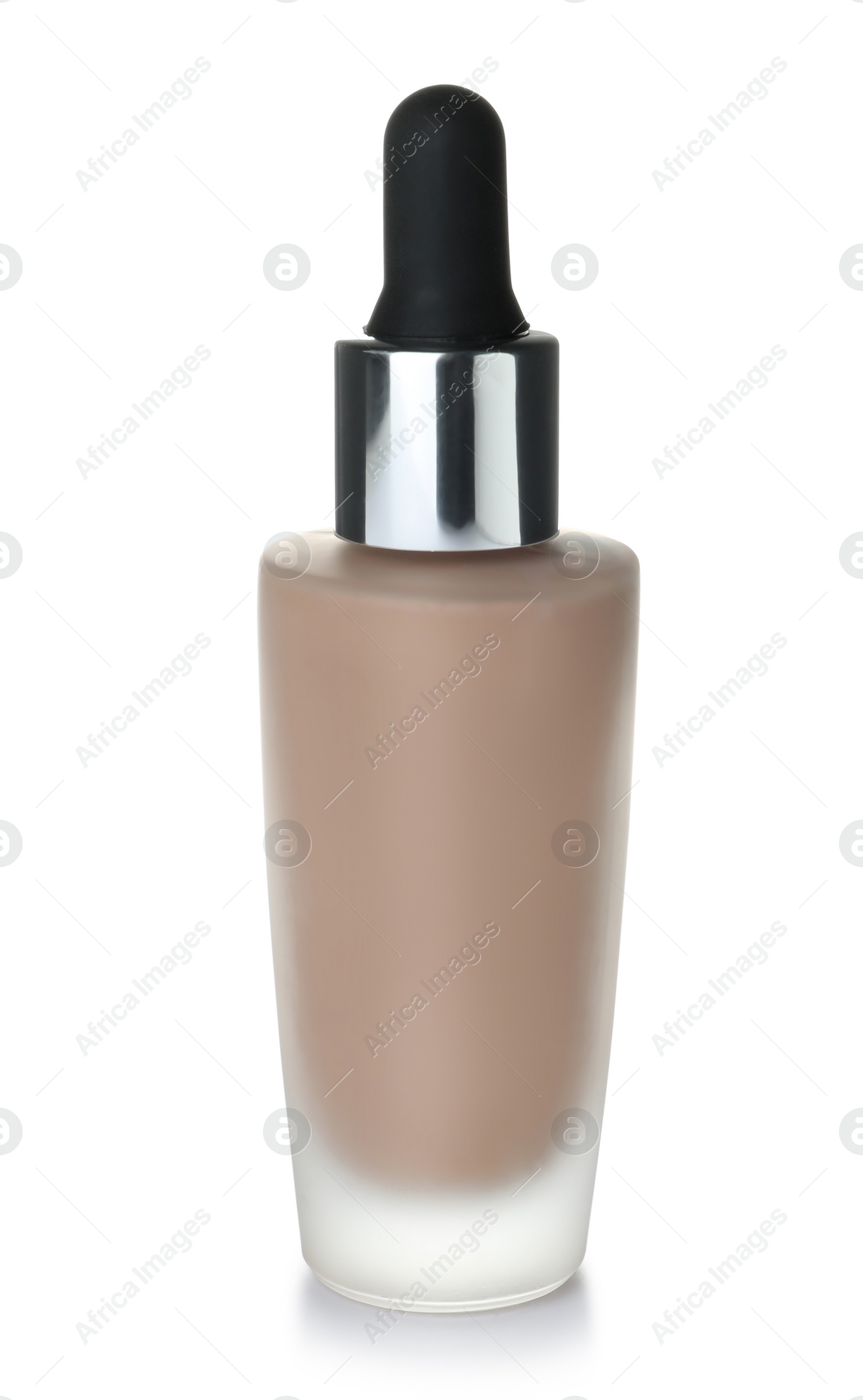 Photo of Bottle of skin foundation on white background