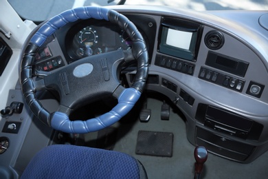 Photo of View of professional driver's cab in modern bus