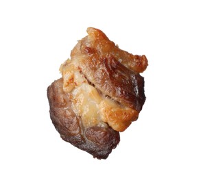 Photo of Tasty fried crackling isolated on white. Cooked pork lard