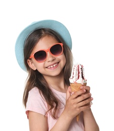 Adorable little girl with delicious ice cream on white background