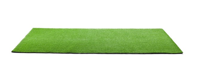 Green artificial grass carpet isolated on white