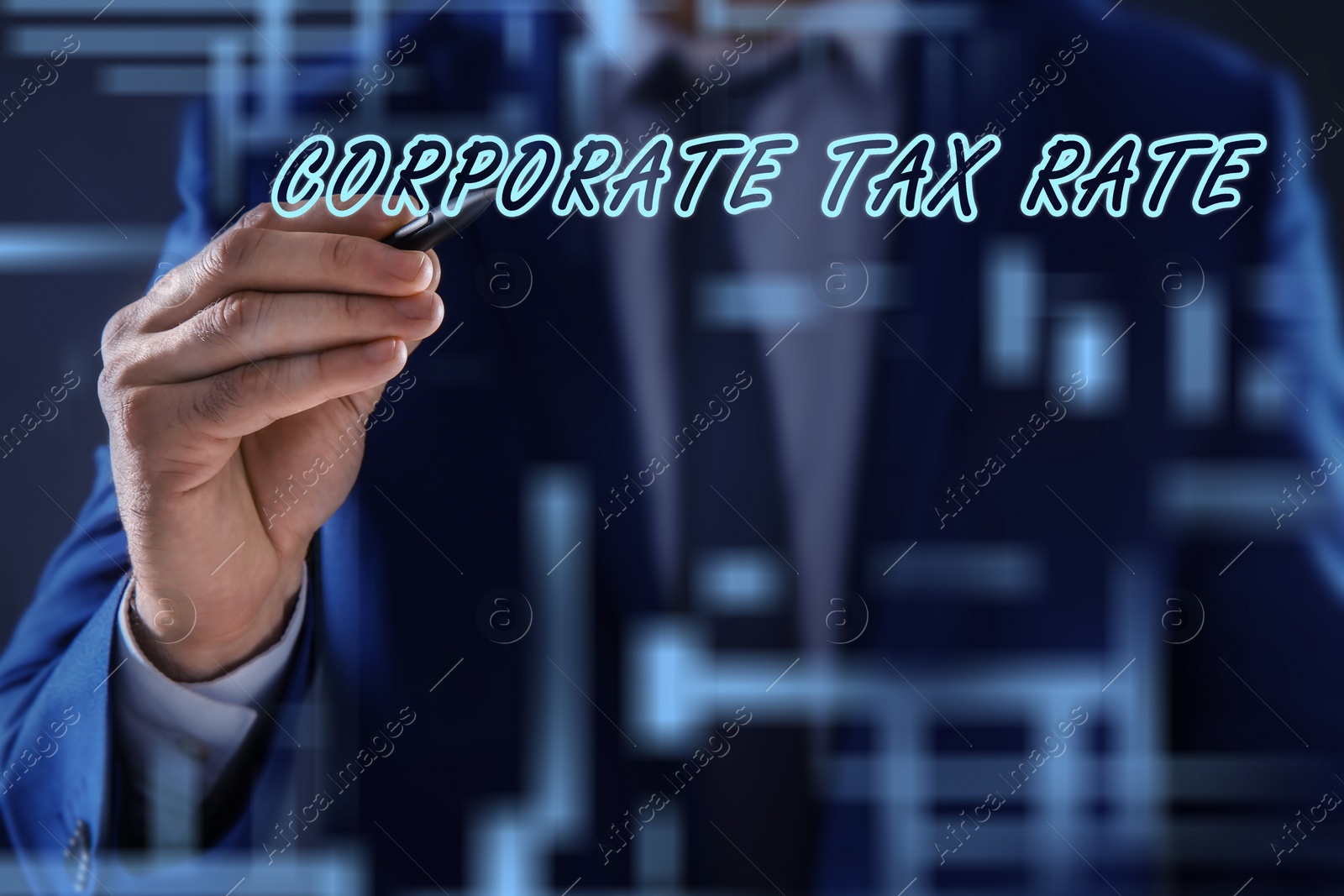 Image of Corporate tax rate. Man writing on virtual screen against color background, closeup