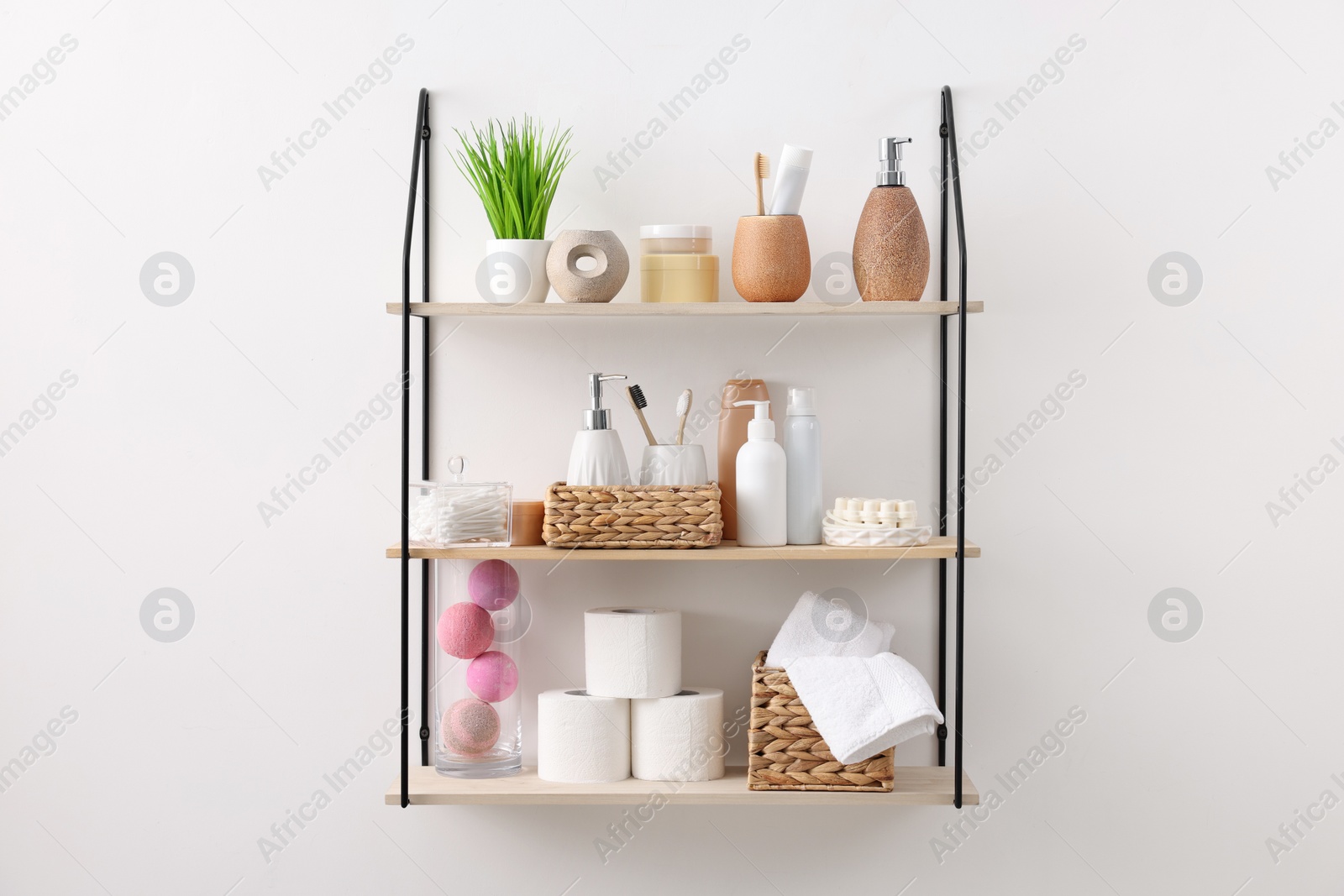 Photo of Different bath accessories, personal care products and artificial plant indoors