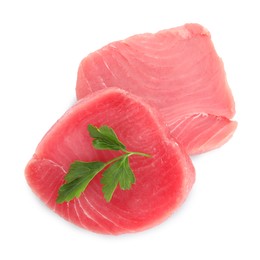 Photo of Fresh raw tuna fillets with parsley on white background, top view