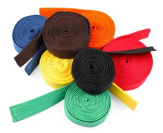 Many different karate belts isolated on white, above view