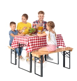 Happy family having picnic at table on white background