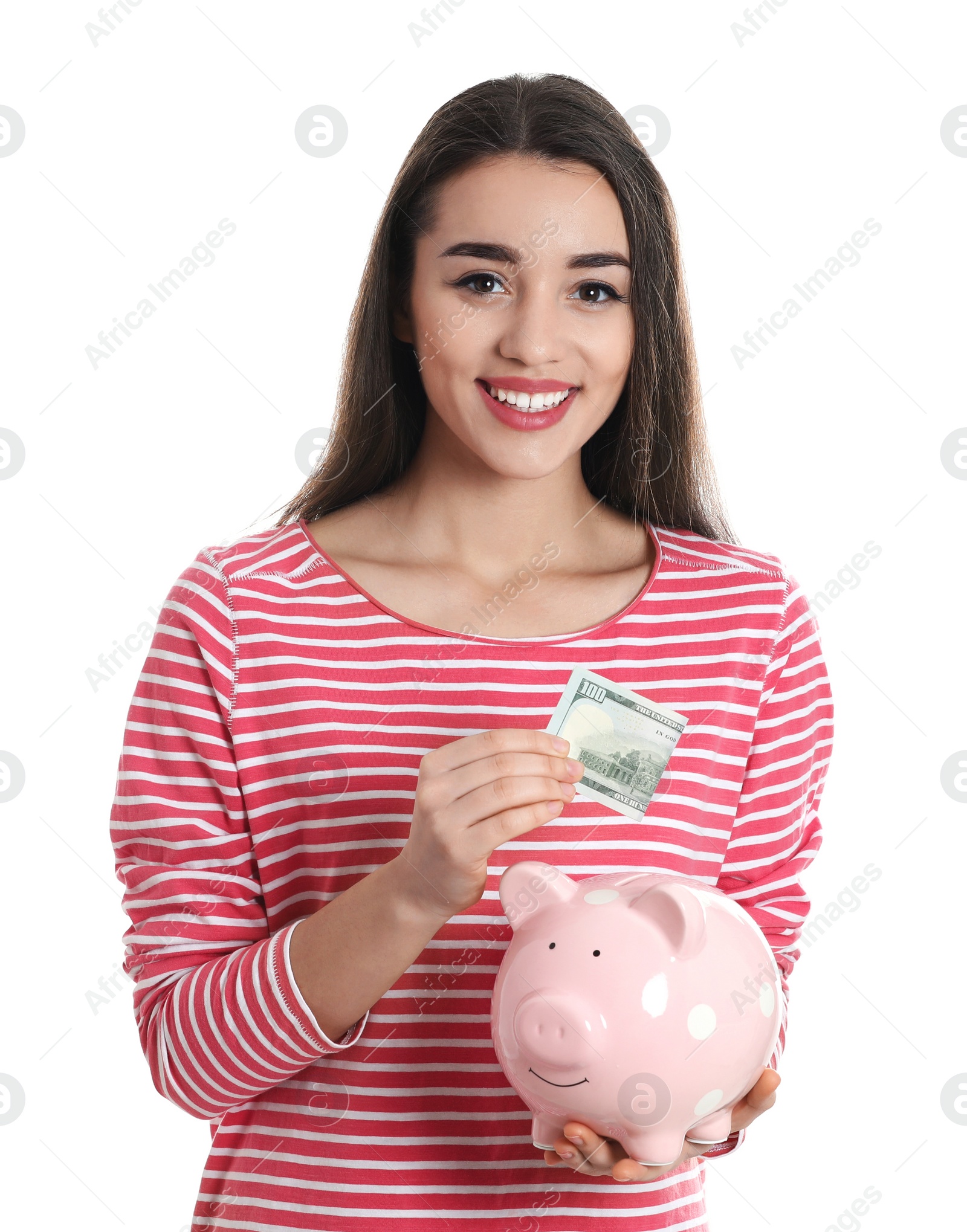 Photo of Portrait of happy young woman with money and piggy bank on white background