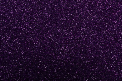 Shiny dark purple glitter as background, closeup