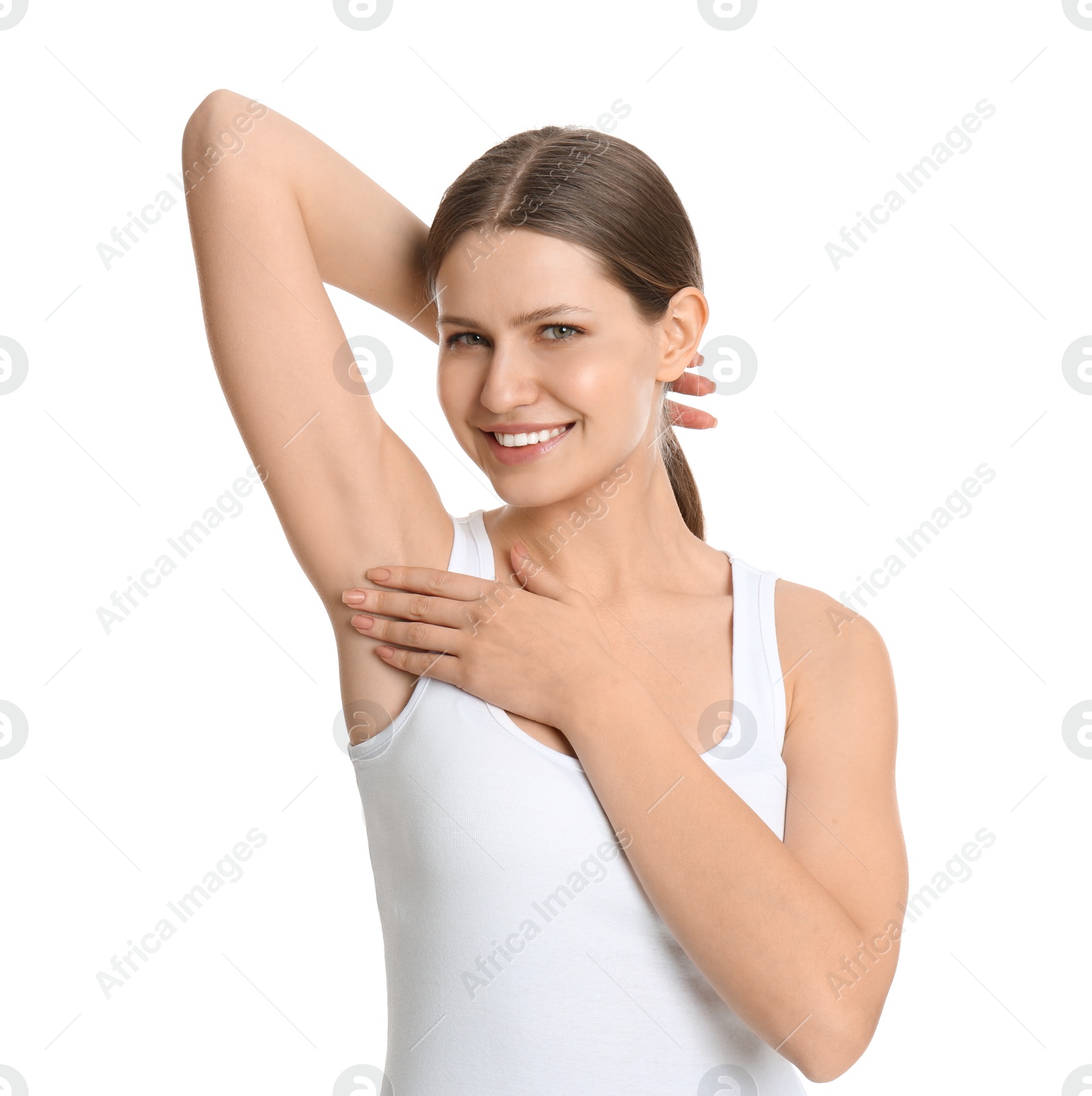 Photo of Young beautiful woman showing armpit with smooth clean skin on white background