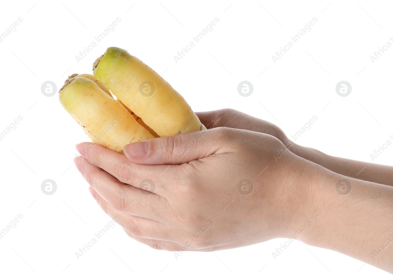 Photo of Woman holding raw carrots on white background, closeup