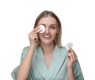 Photo of Young woman with cotton pads on white background
