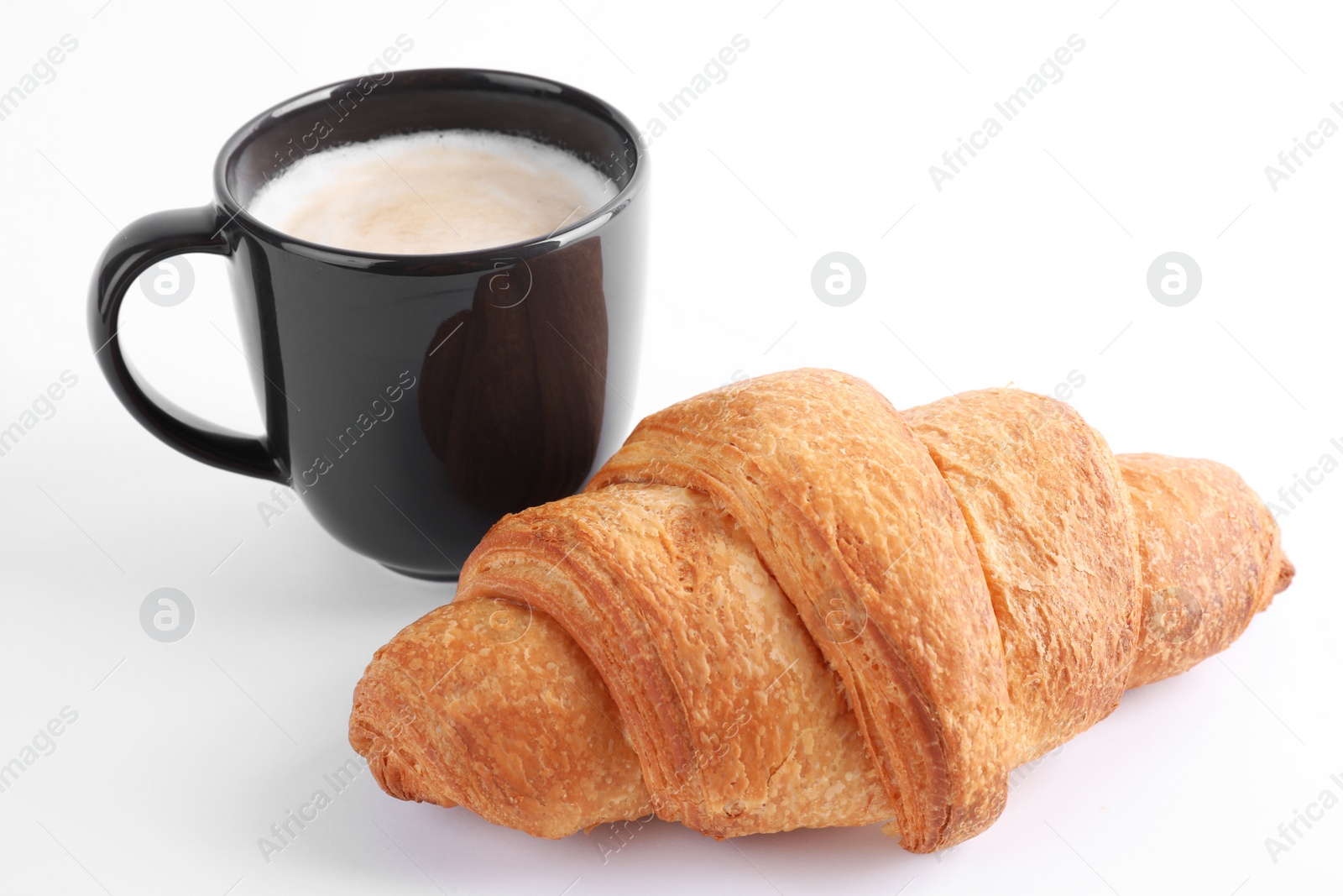 Photo of Tasty fresh croissant and coffee on white background