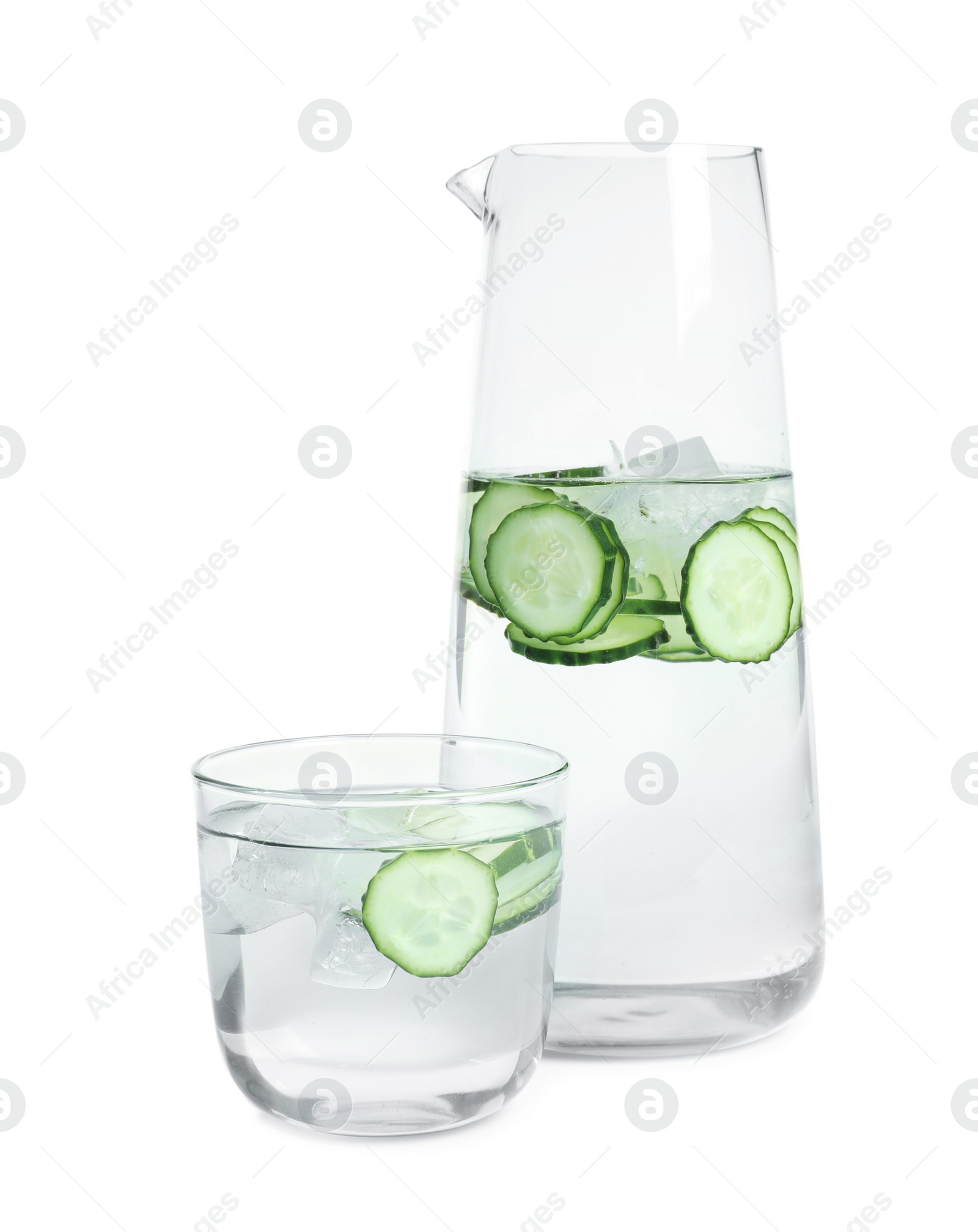 Photo of Jug and glass of fresh cucumber water on white background