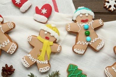 Delicious Christmas cookies on wooden table, flat lay