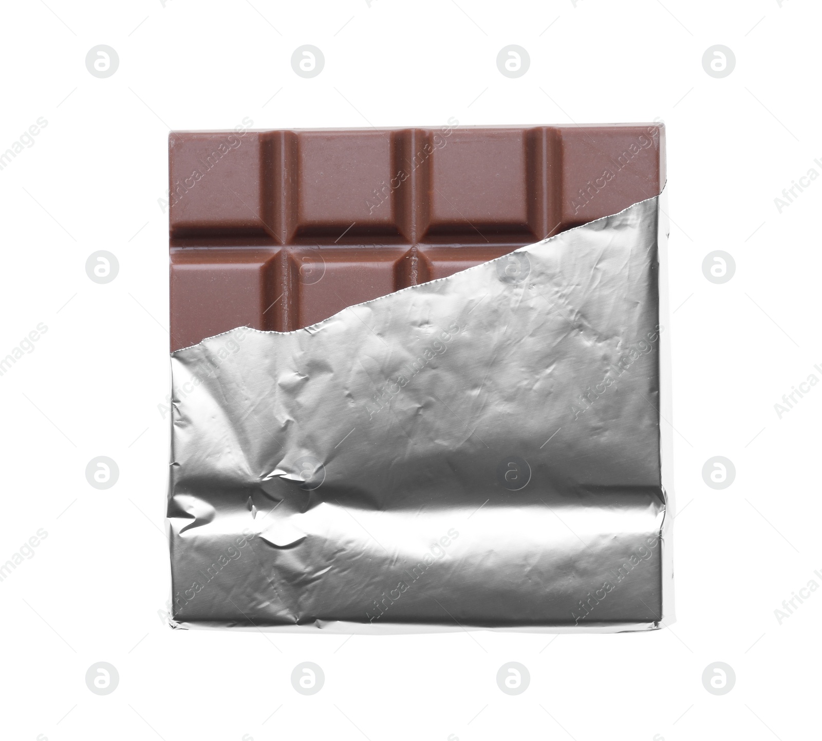 Photo of Delicious milk chocolate bar wrapped in foil isolated on white