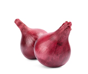 Ripe red onions on white background