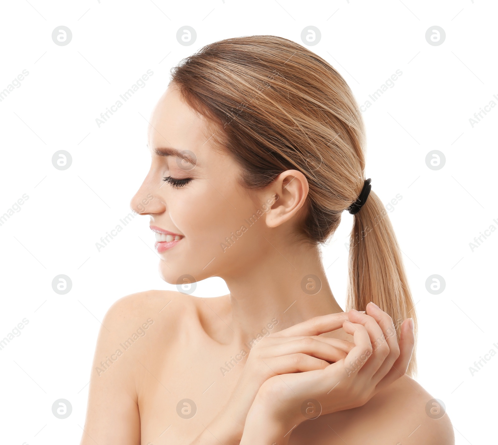 Photo of Beautiful young woman with silky skin on white background