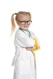 Cute little child in doctor coat with stethoscope on white background