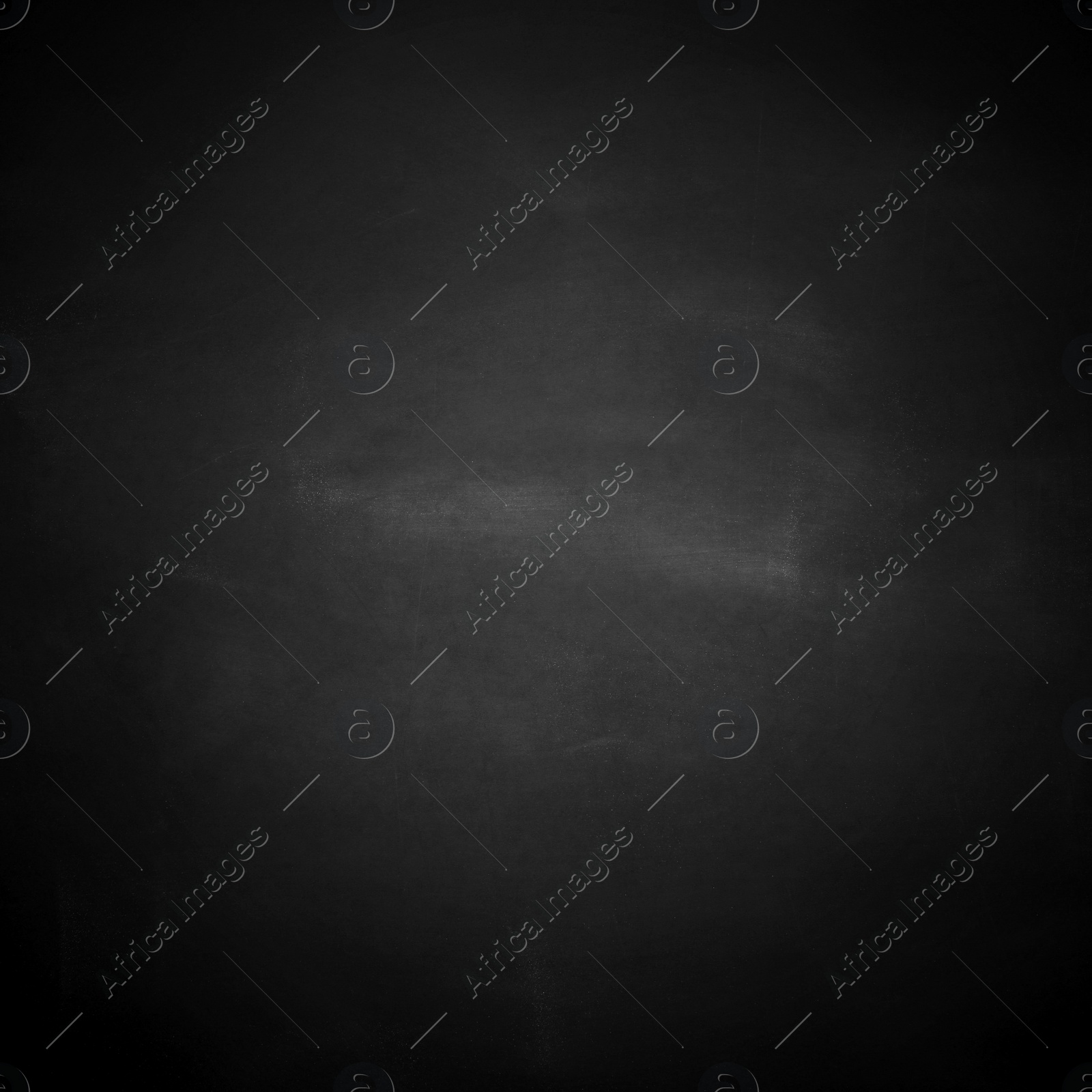 Image of Dirty black chalkboard as background. Vignette effect