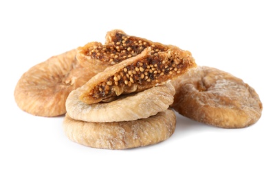 Pile of tasty dried figs on white background