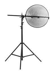 Photo of Tripod with studio reflector isolated on white. Professional photographer's equipment