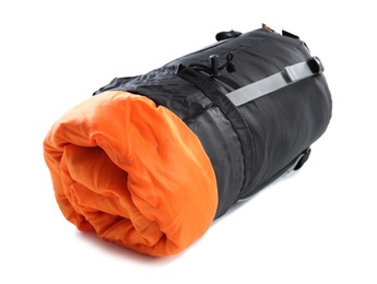 Photo of Rolled sleeping bag on white background. Camping equipment