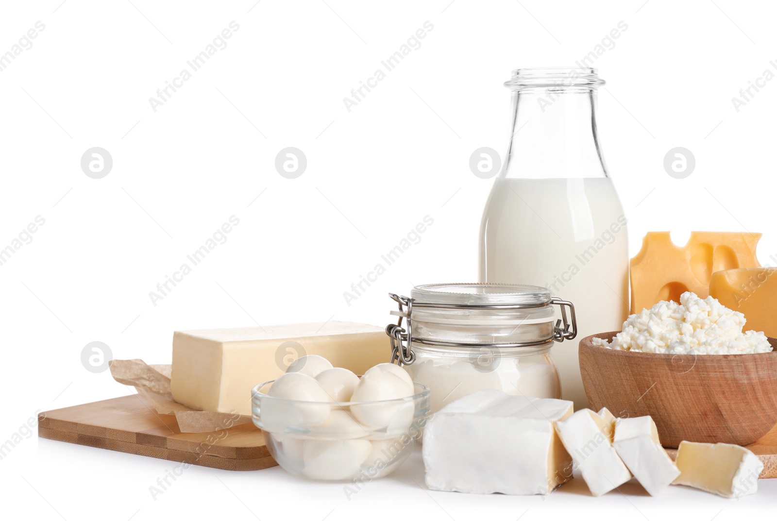 Photo of Set of different dairy products isolated on white