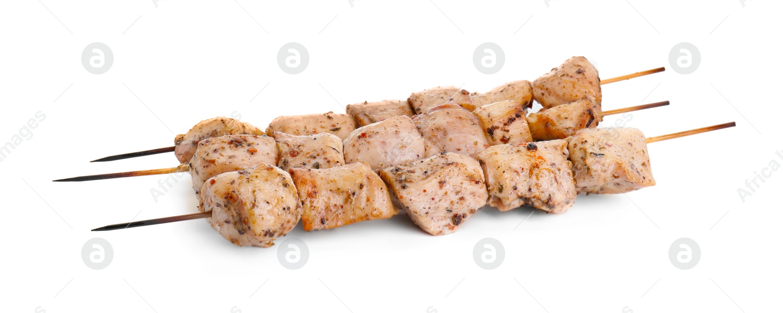 Photo of Skewers with delicious fresh shish kebabs isolated on white