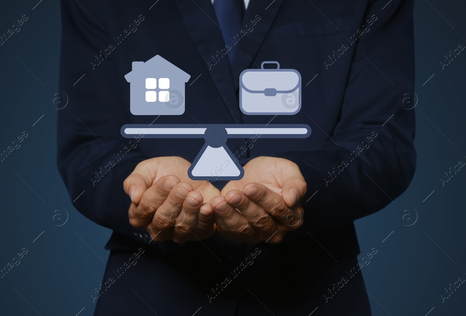 Image of Man holding virtual icons against dark background, closeup. Concept of balance between life and work