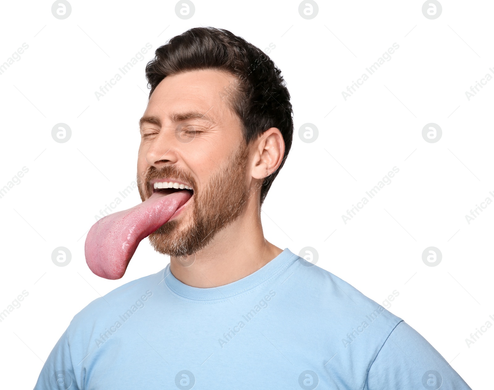 Image of Portrait of handsome man showing long tongue on white background