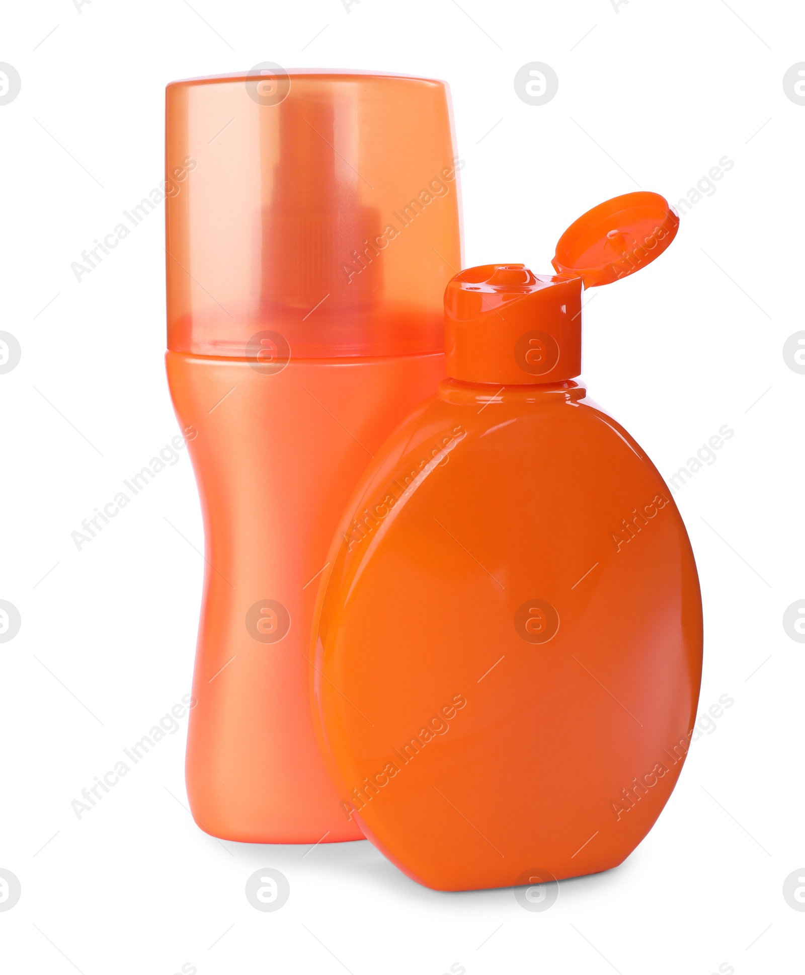 Photo of Bottles with sun protection products isolated on white