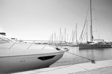 Image of Modern boats near pier. Black and white tone 