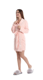 Photo of Young woman in bathrobe on white background