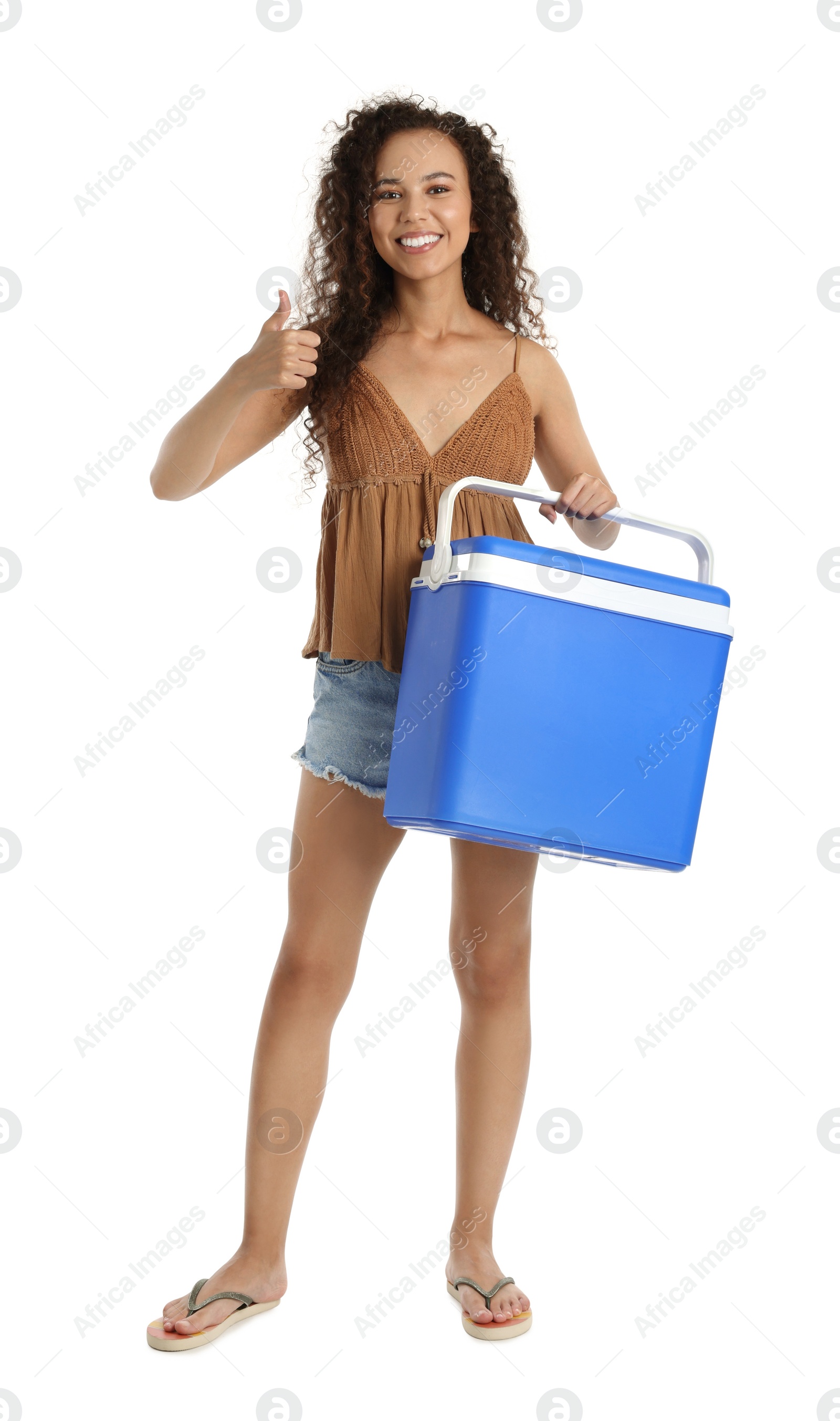 Photo of Happy young African American woman with cool box showing thumb up on white background