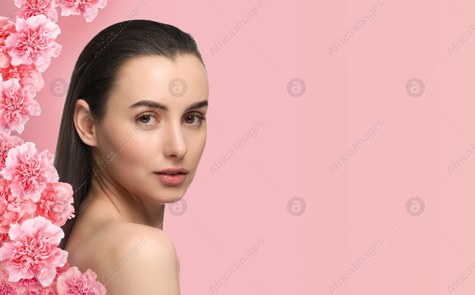 Image of Beautiful woman with smooth skin and flowers on pink background. Space for text