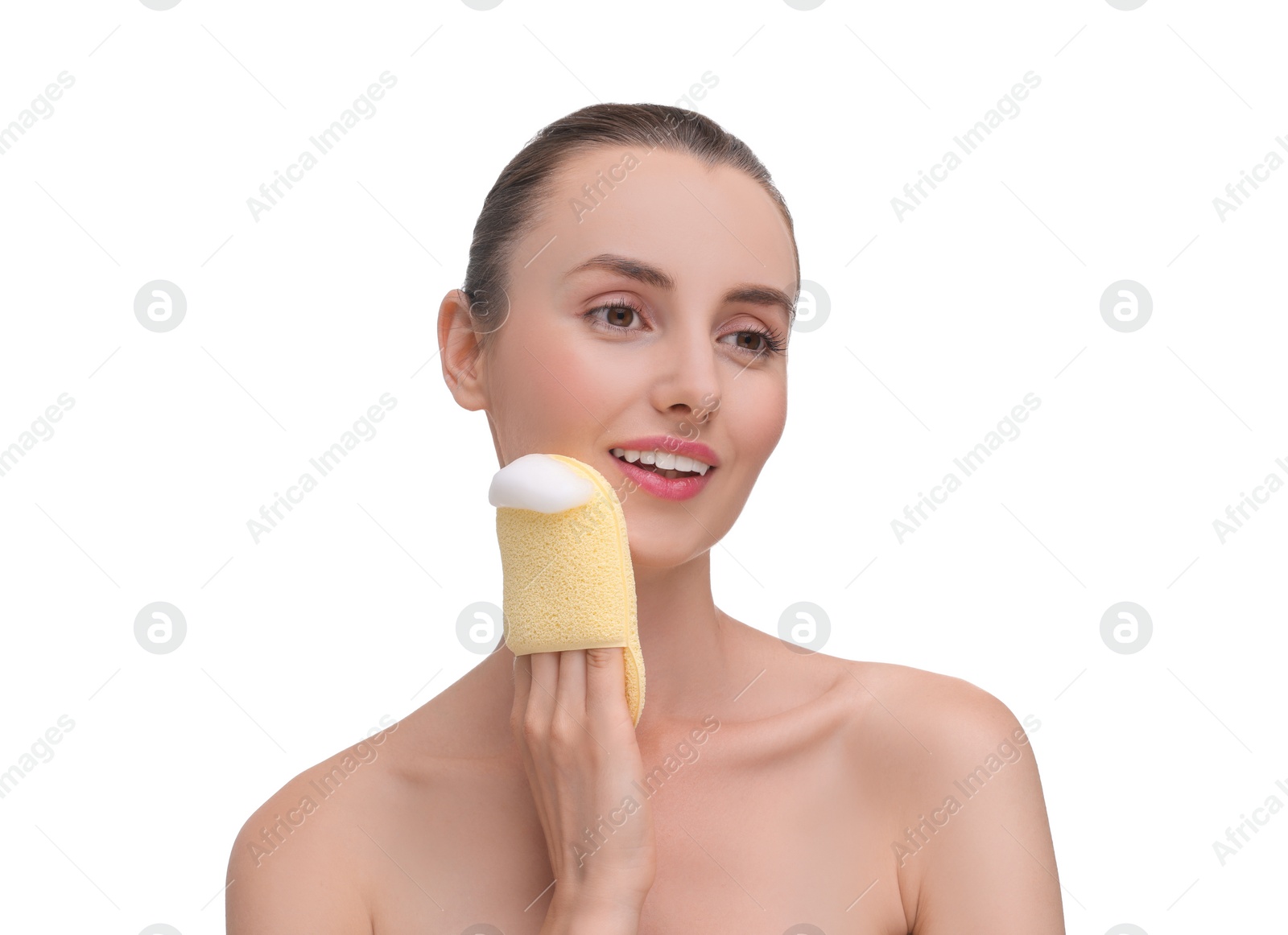 Photo of Happy young woman washing her face with sponge on white background