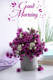 Image of Good morning! Beautiful flowers, books and violet cloth on white table