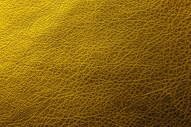 Image of Golden textured surface as background, closeup view