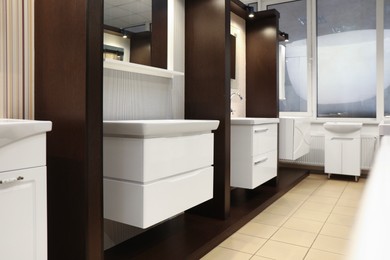 Assortment of bathroom vanity units in store