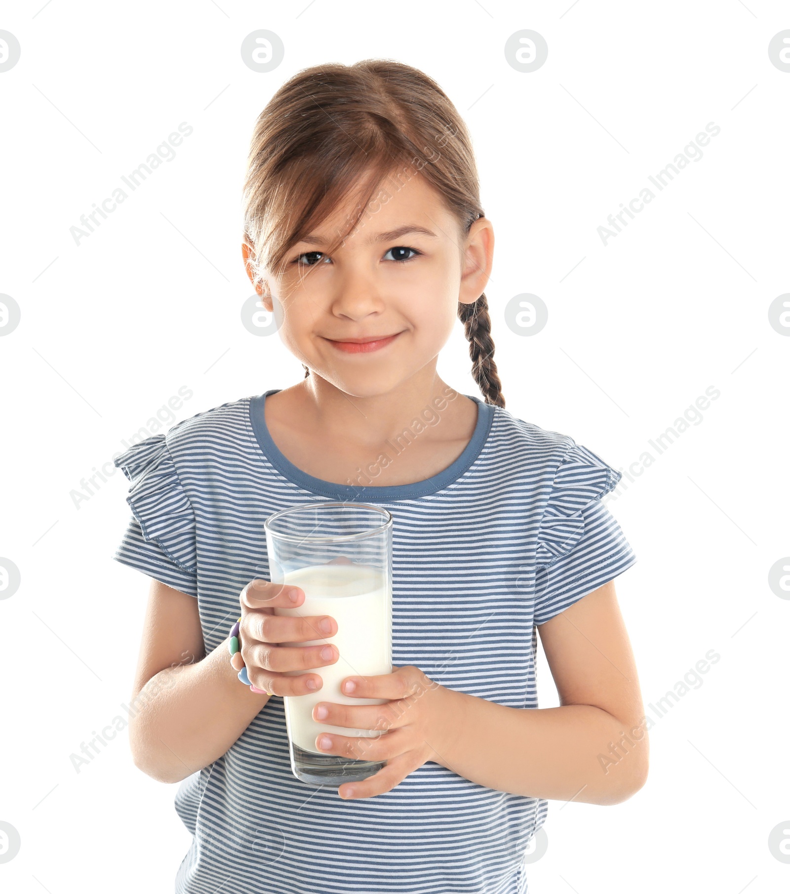 Photo of Cute little girl with glass of milk on white background