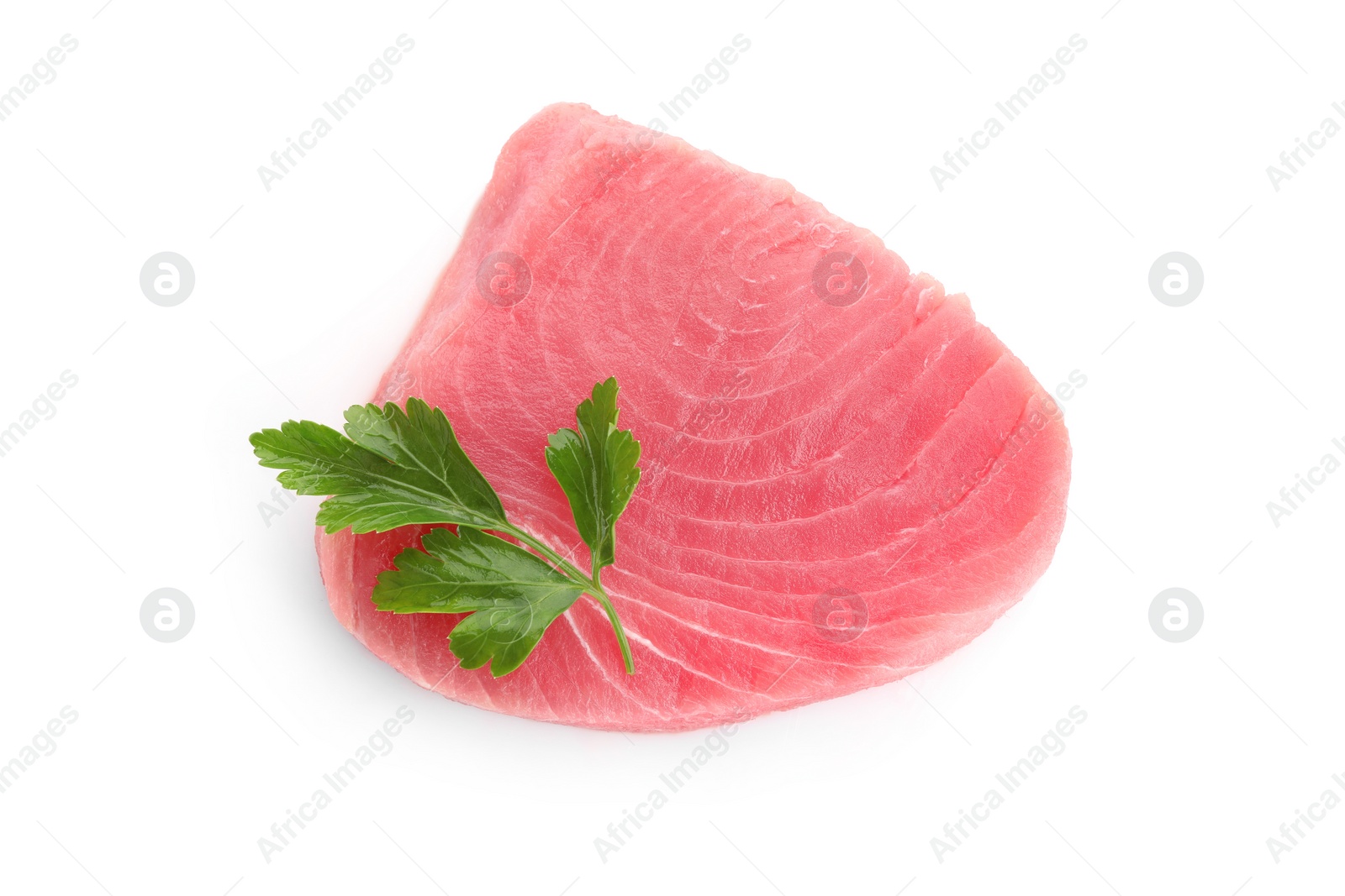 Photo of Fresh raw tuna fillet with parsley on white background, top view