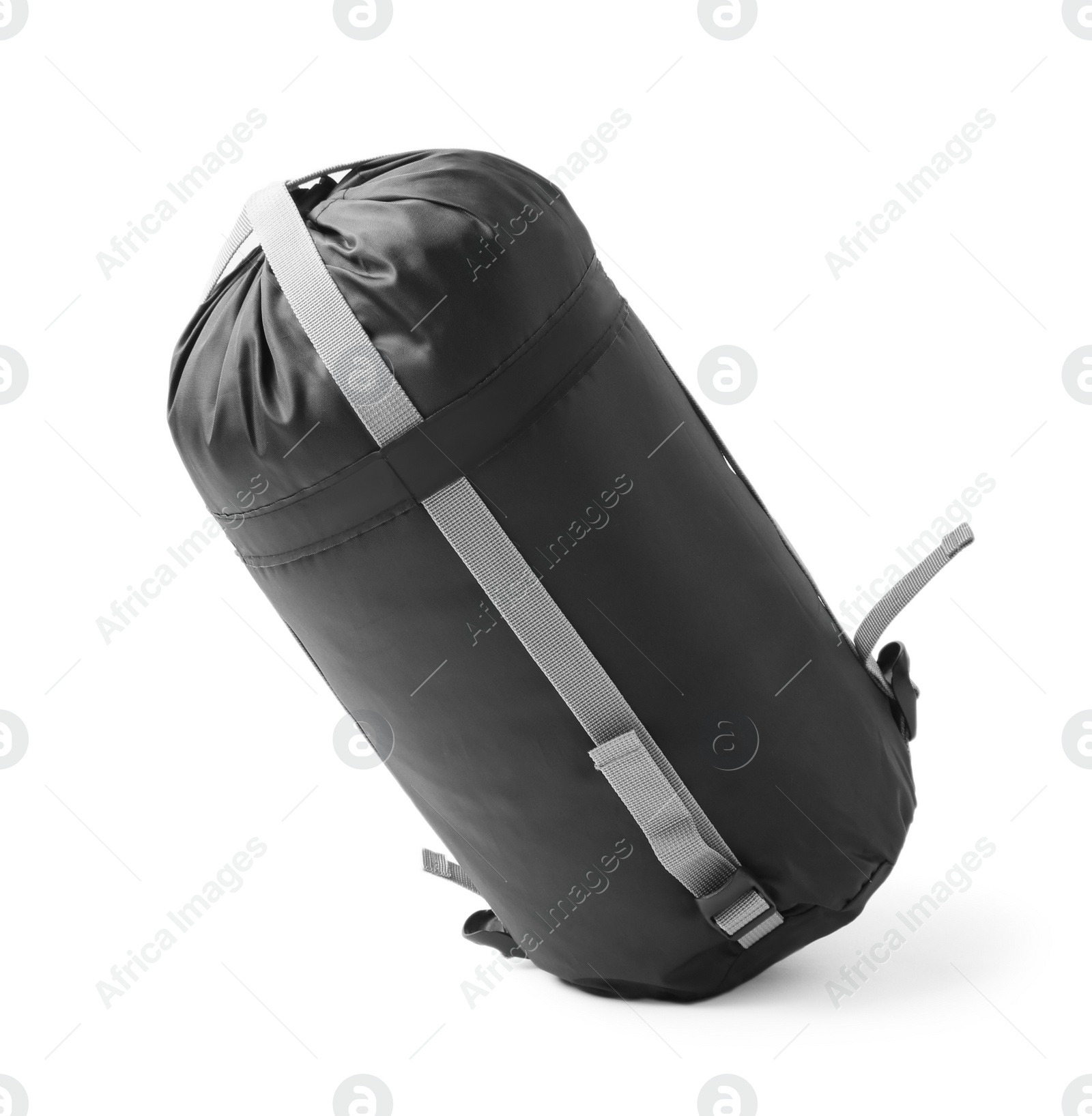 Photo of Case with sleeping bag on white background. Camping equipment