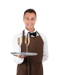 Waiter holding metal tray with glasses of champagne on white background