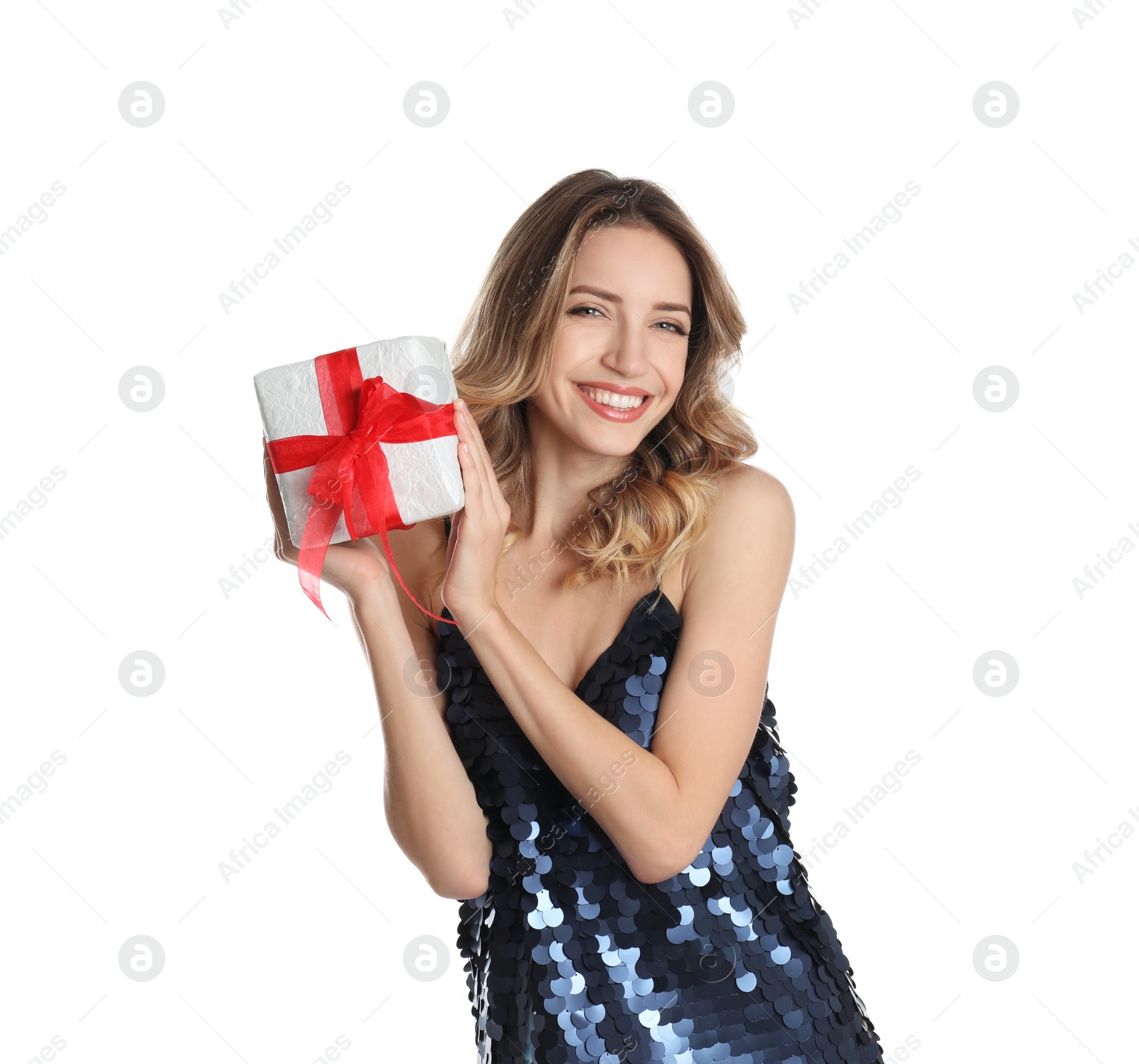 Photo of Beautiful young woman with Christmas present on white background